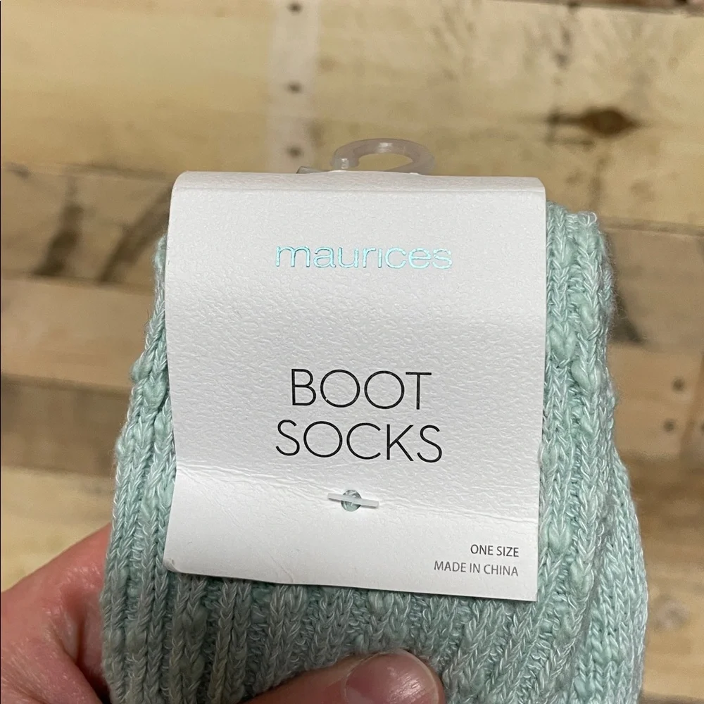 One Maurices brand boot socks and Unicorn Slippers